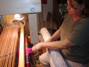 Tying the Yarn to the Cloth Apron